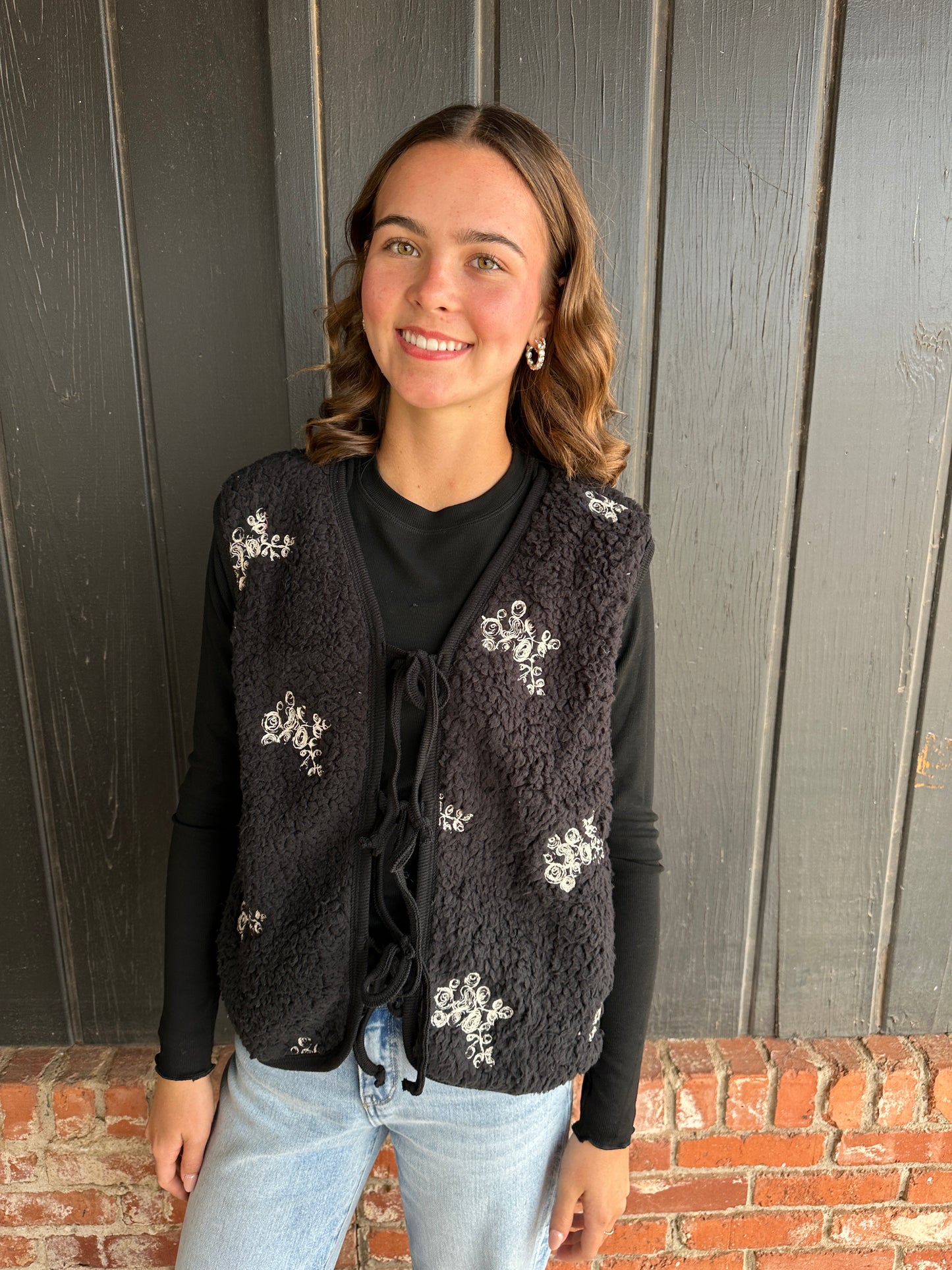 Black embroidered teddy fur vest