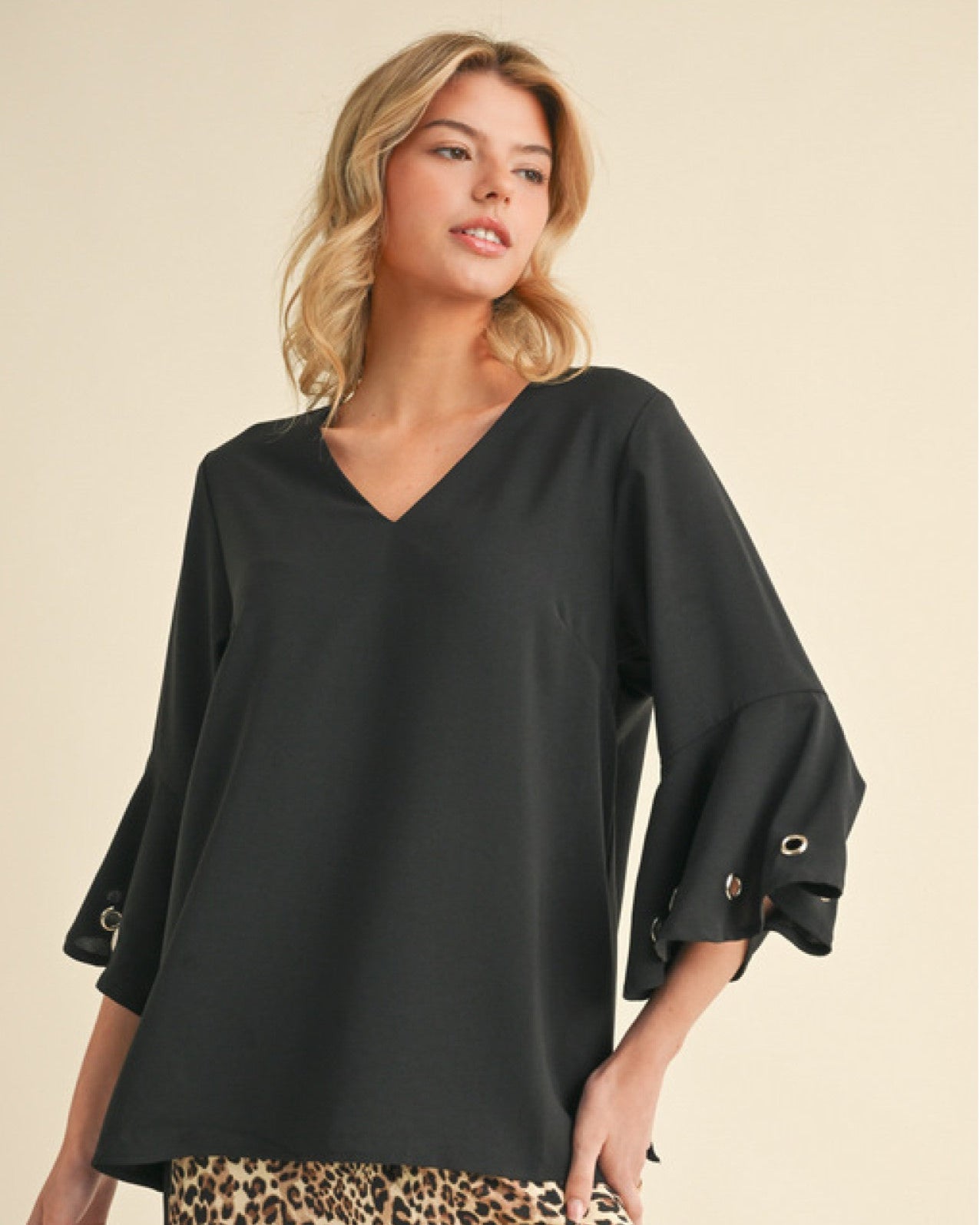Black three quarter sleeve top with eyelet detail