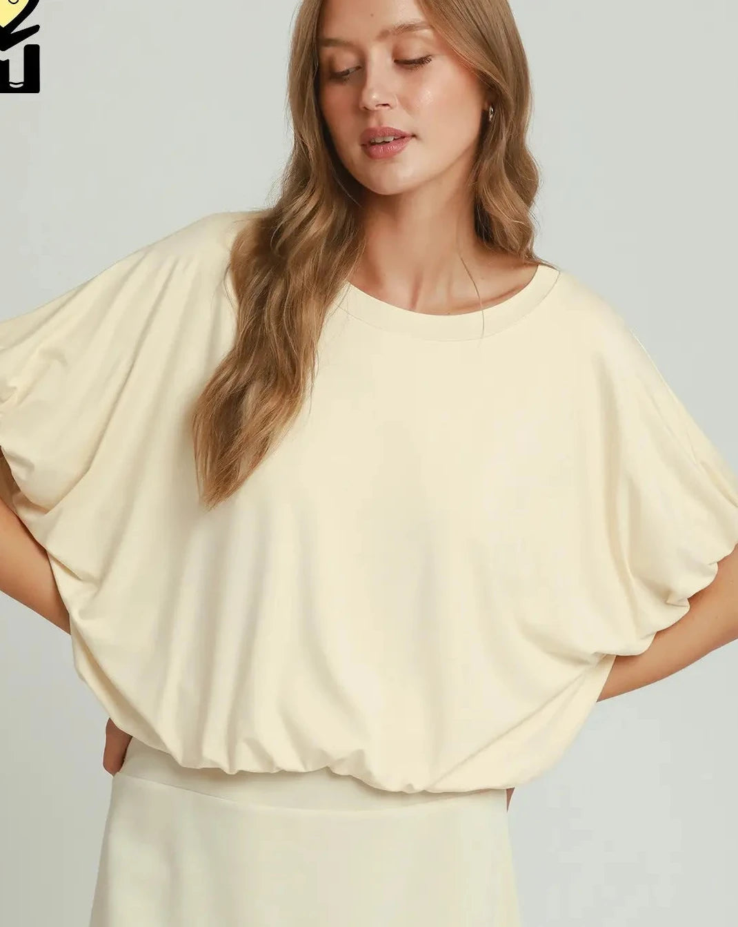 Ivory bubble hem top