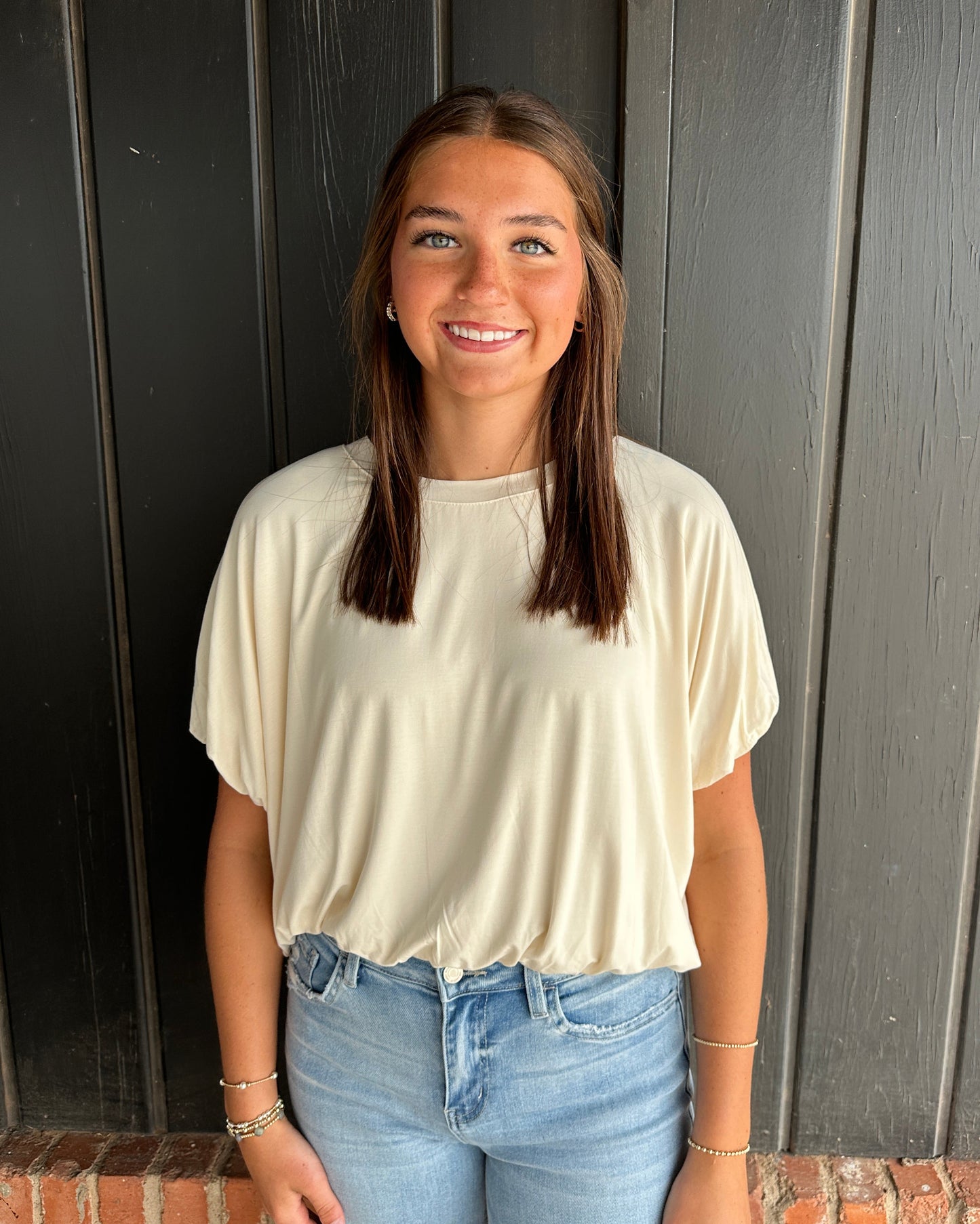Ivory bubble hem top