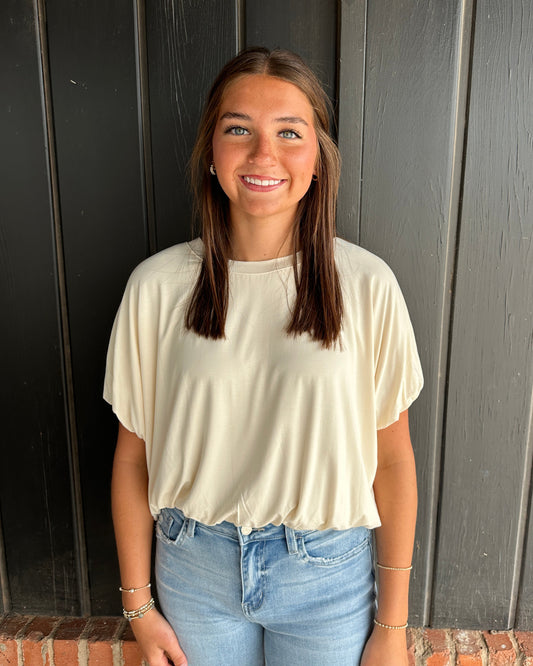 Ivory bubble hem top