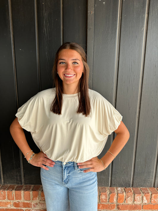 Ivory bubble hem top