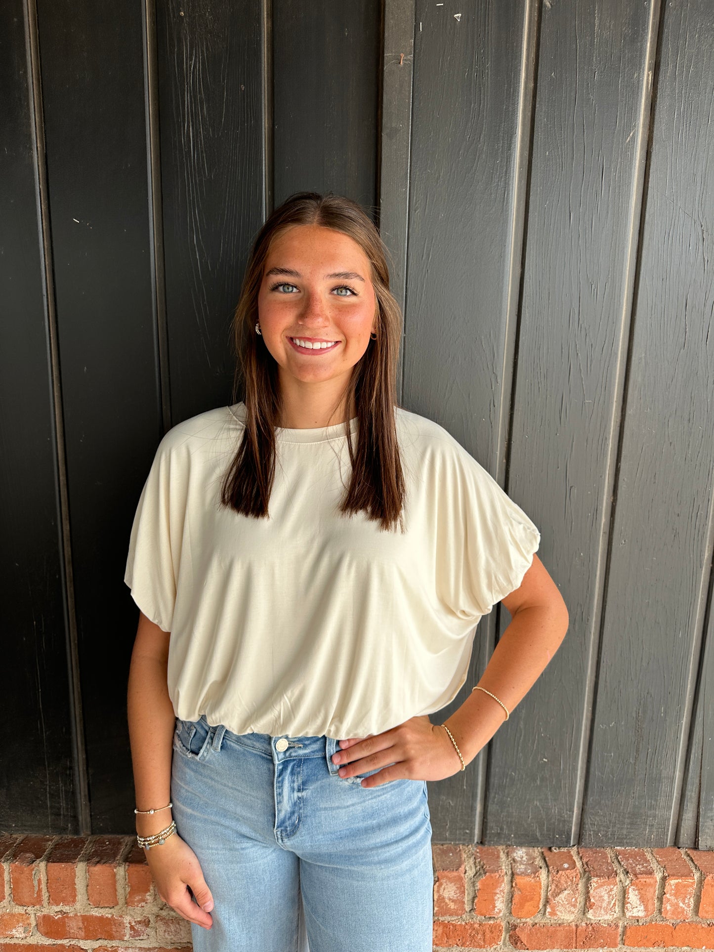 Ivory bubble hem top