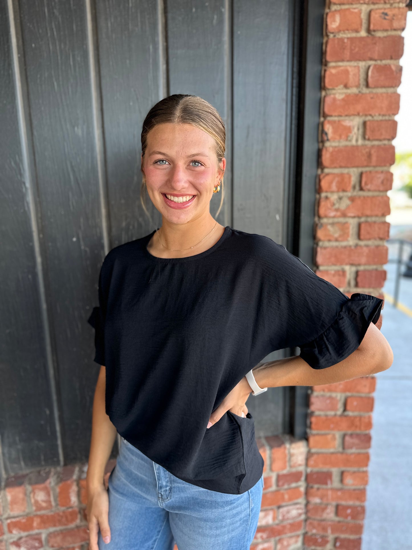 Black ruffle sleeve top