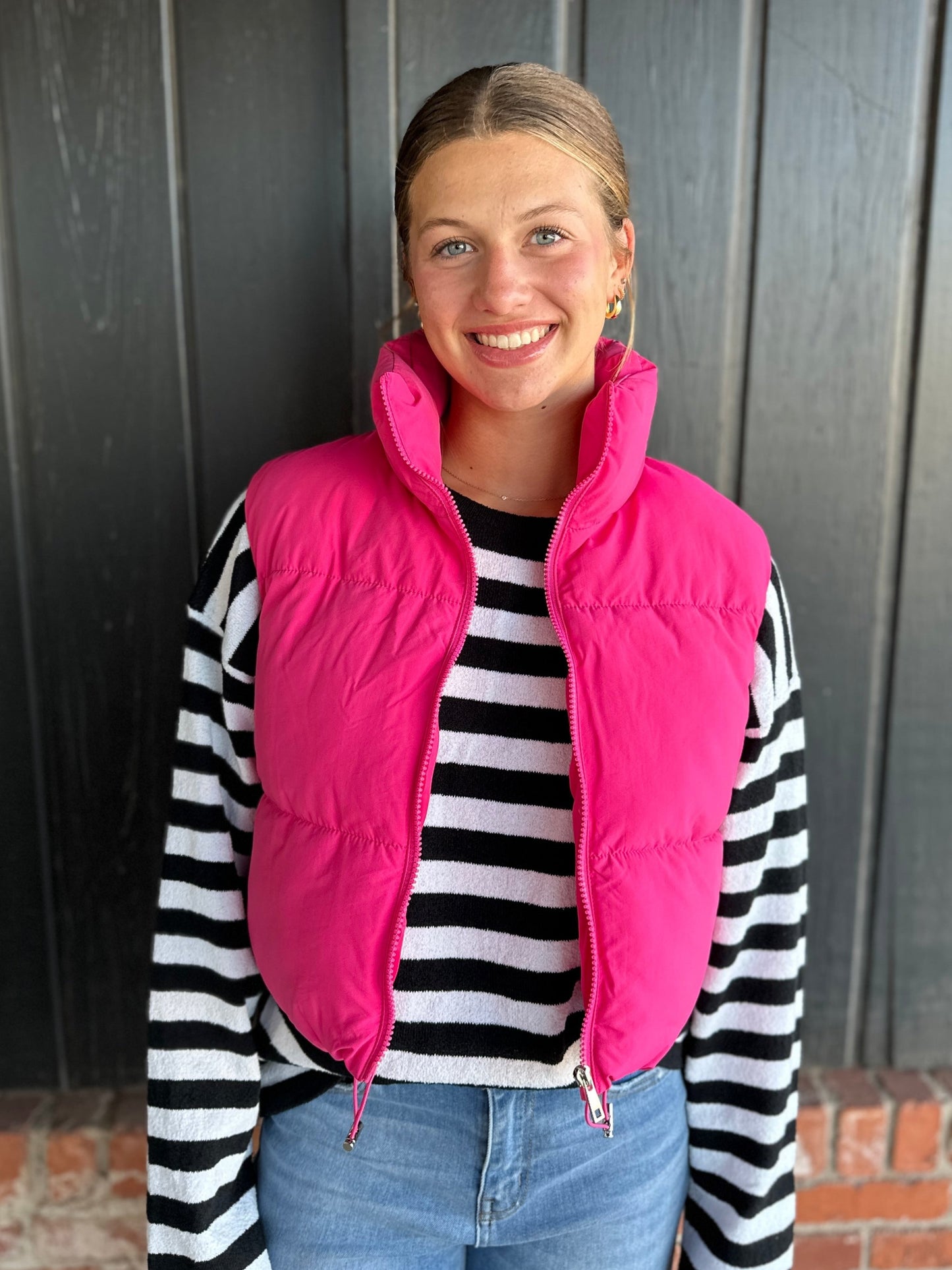 The Heather bright pink puffer vest