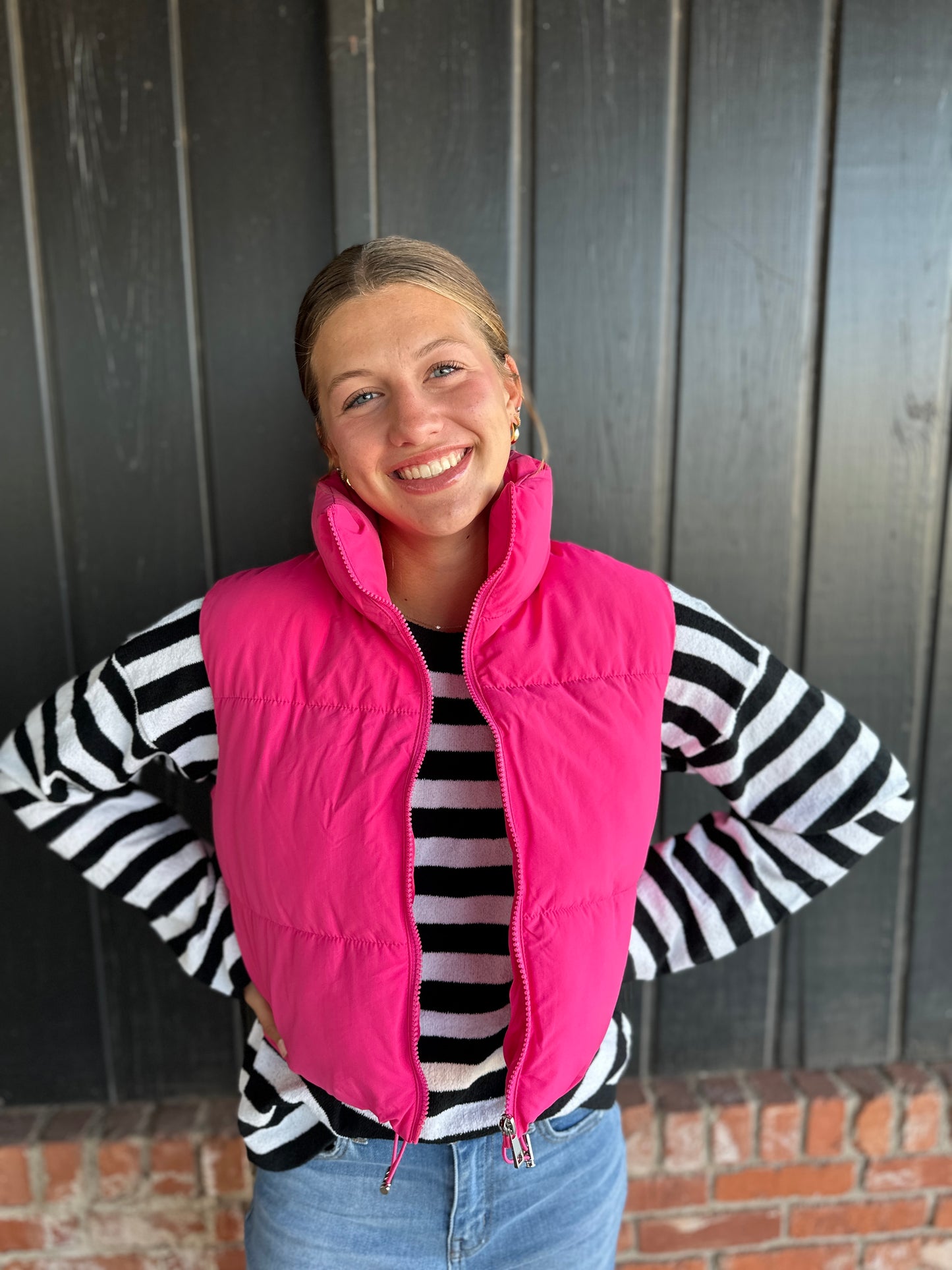 The Heather bright pink puffer vest