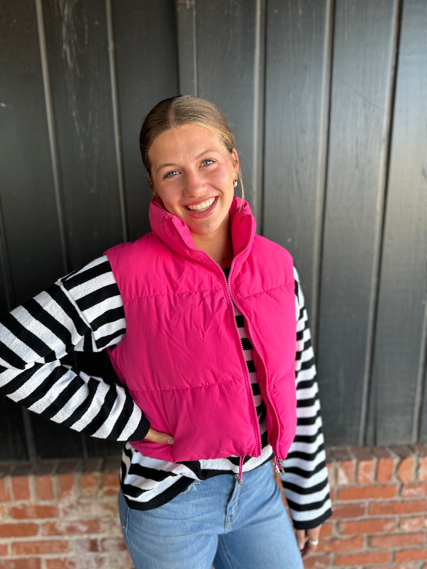 The Heather bright pink puffer vest