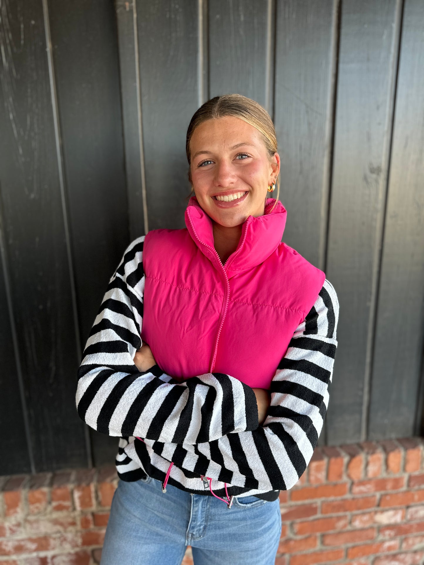 The Heather bright pink puffer vest