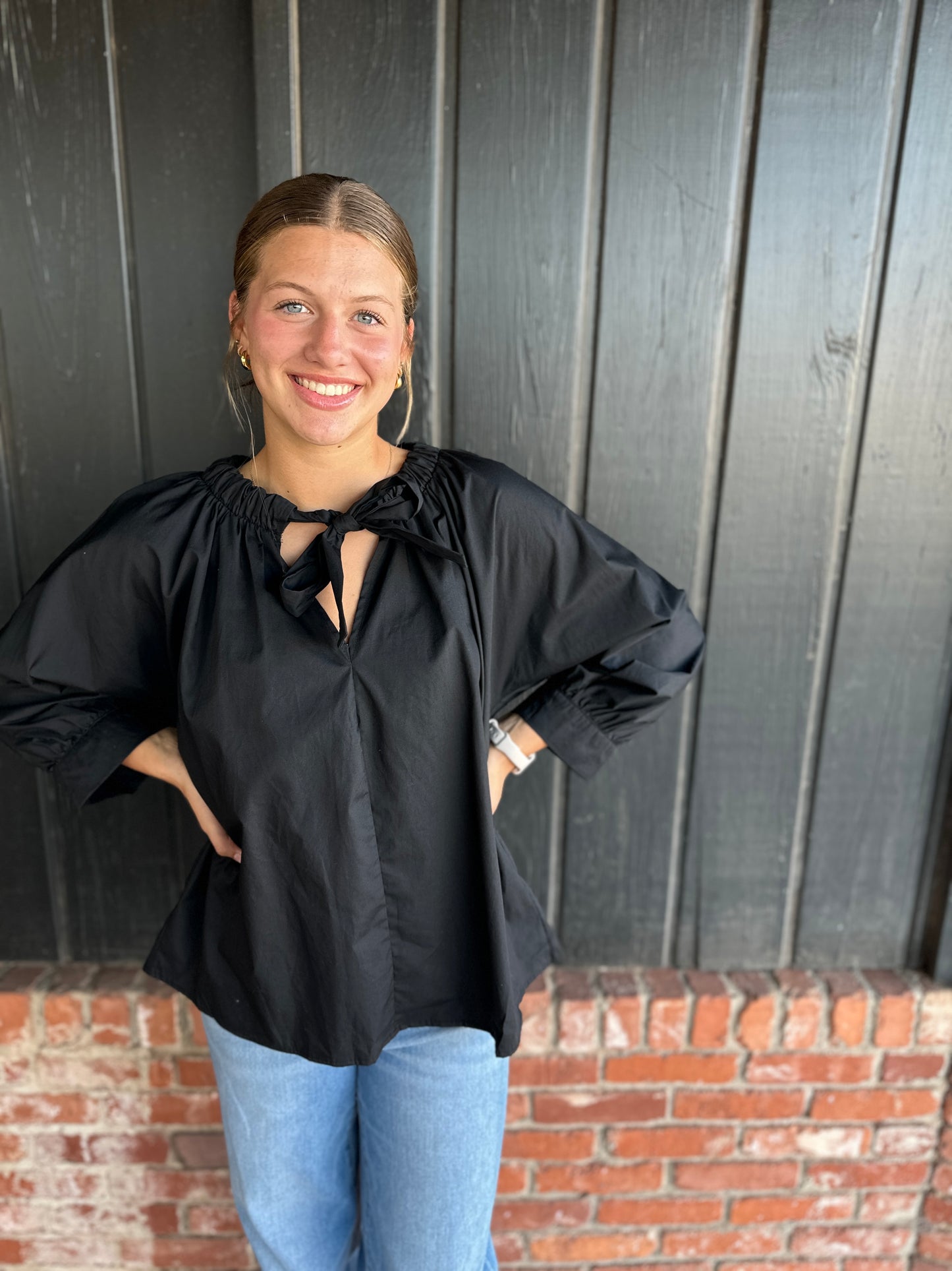 The Angie Black Poplin top with bow neckline