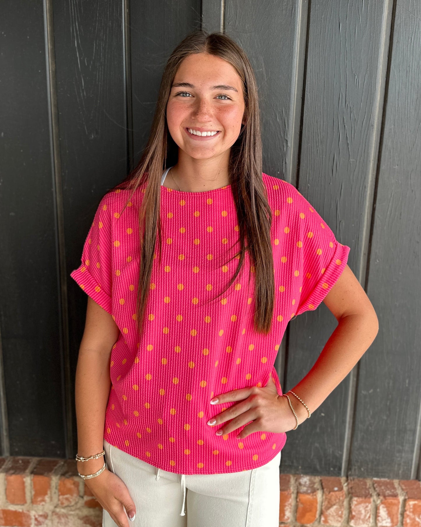 Pink and orange polka dot ribbed top