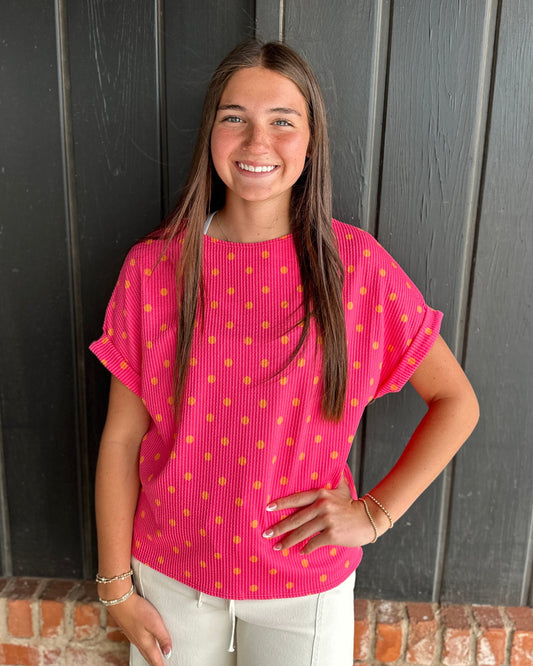 Pink and orange polka dot ribbed top