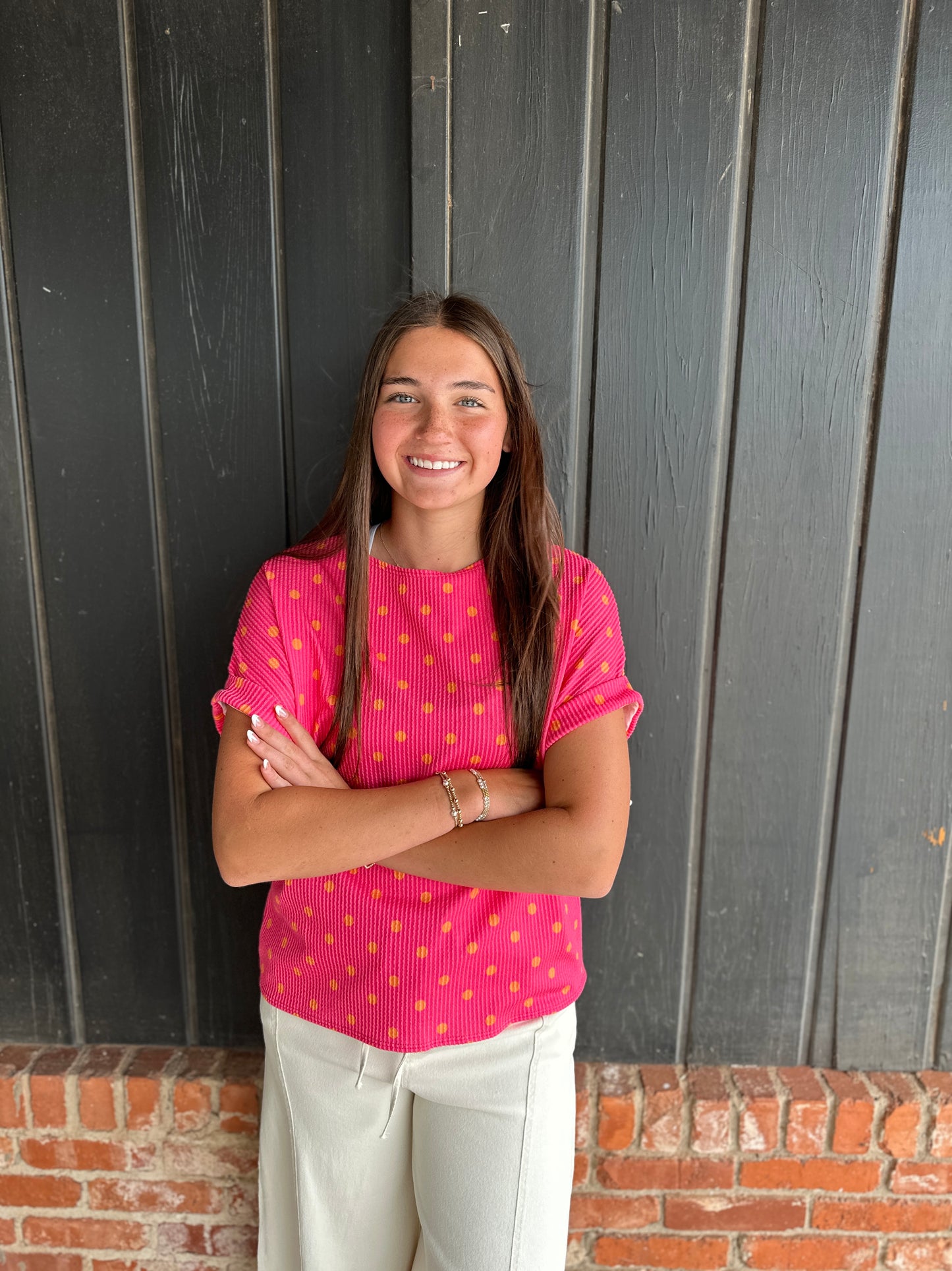 Pink and orange polka dot ribbed top