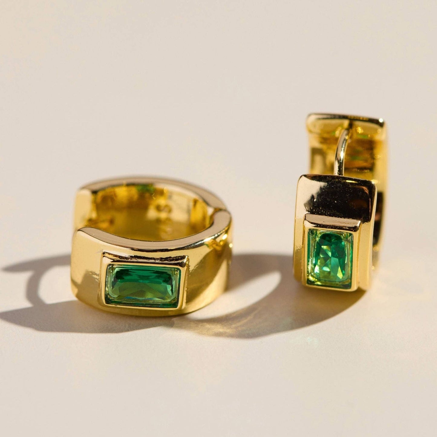 Green Baguette Bezel Huggies in Gold