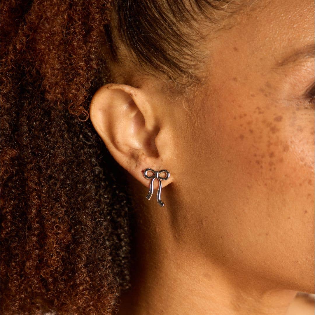 Silver Vintage Bow Studs Nickel & Suede