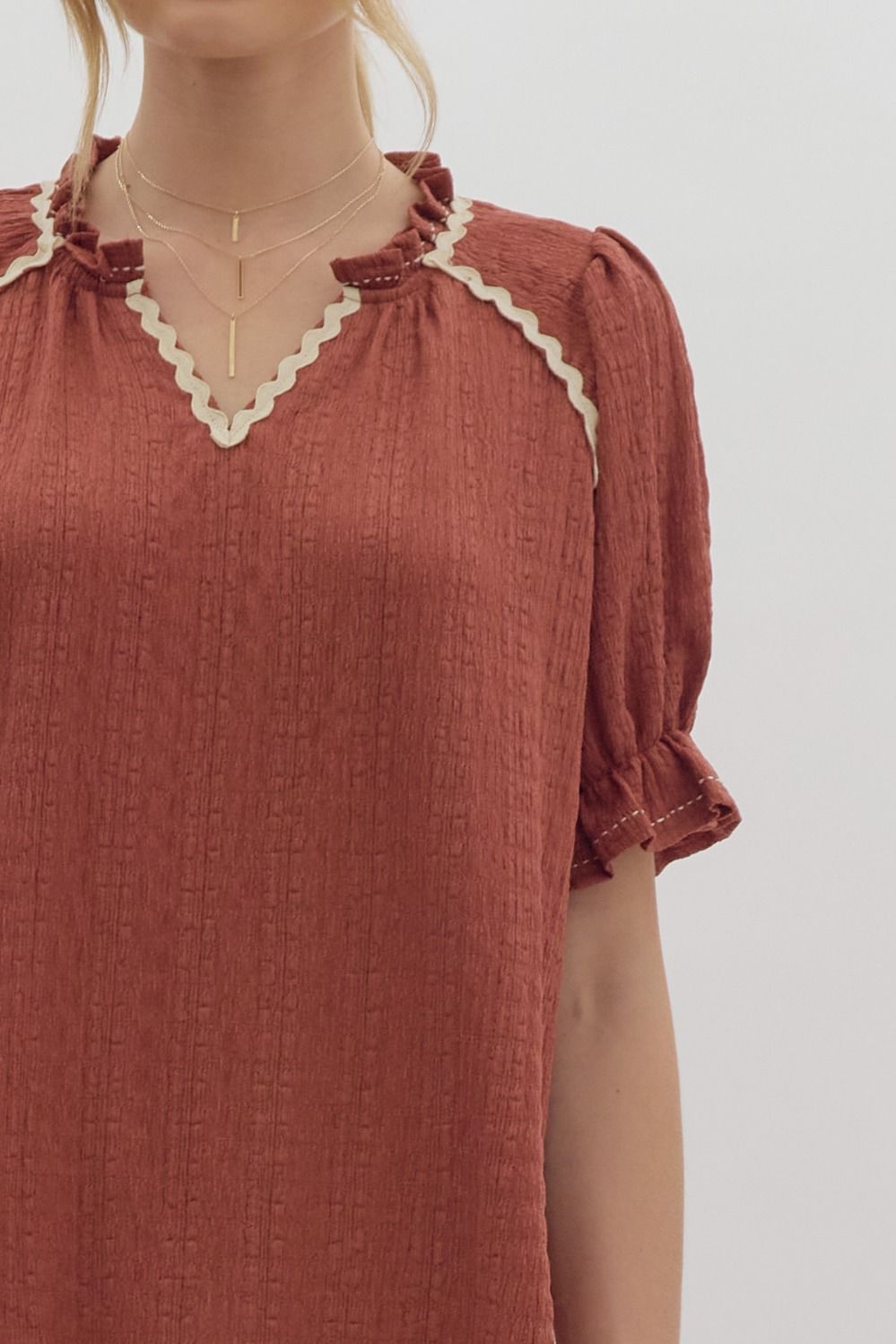 Cinnamon V neck top with ric rac detail