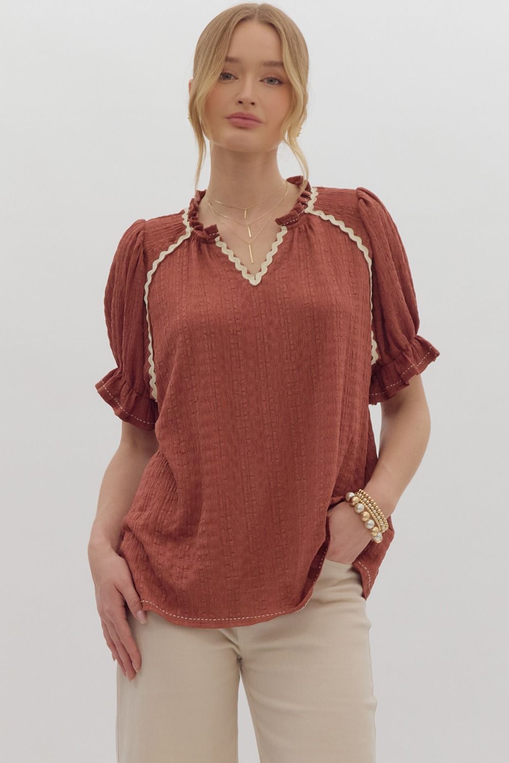 Cinnamon V neck top with ric rac detail