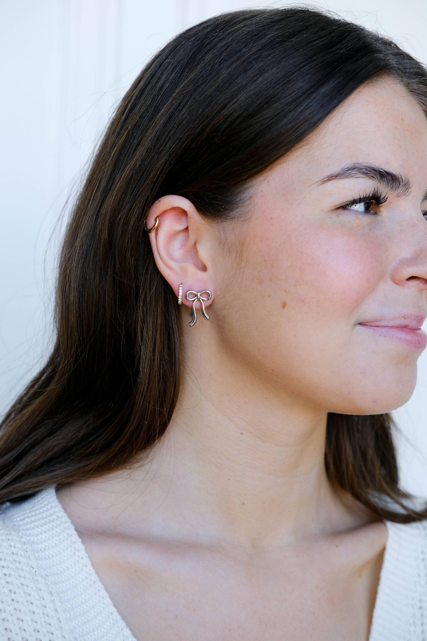 Silver Vintage Bow Studs Nickel & Suede