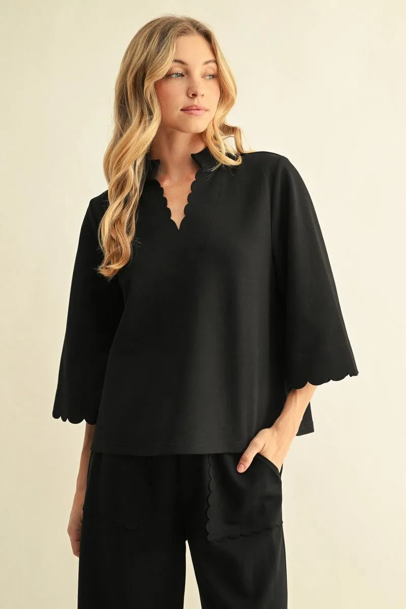 Black 3/4 sleeve top with scallop edge